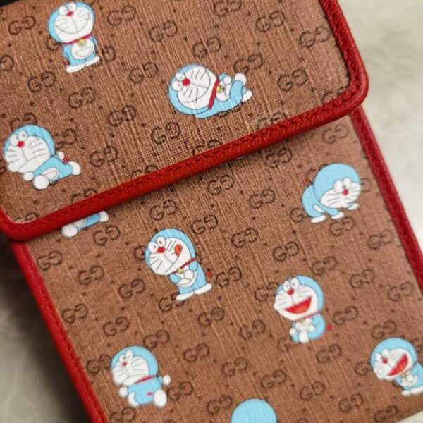 最高等級gucci挎包GUCCI最新 Doraemon x Gucci聯名系列～手機包 “大胖子”哆啦A夢 647802 xxqb10621