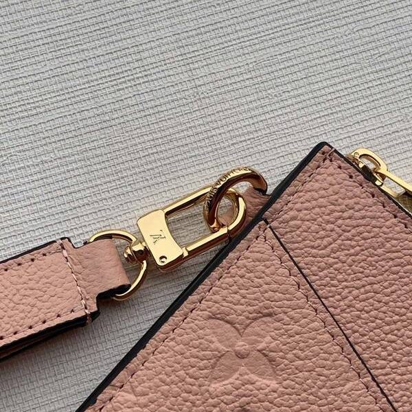 LV 手拿包粉色壓花Monogram Empreinte