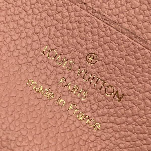 LV 手拿包粉色壓花Monogram Empreinte