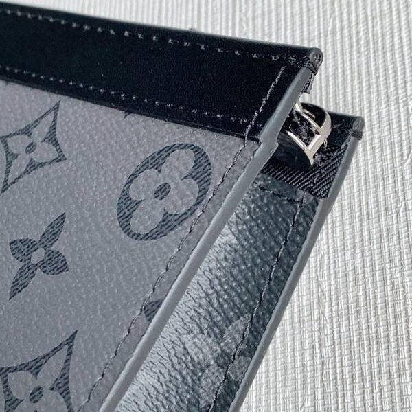 高仿奢侈品原單M69535 Pochette Voyage 中號手拿包Monogram Eclipse 帆布和 Monogram Eclipse Reverse 帆布hhlv11632