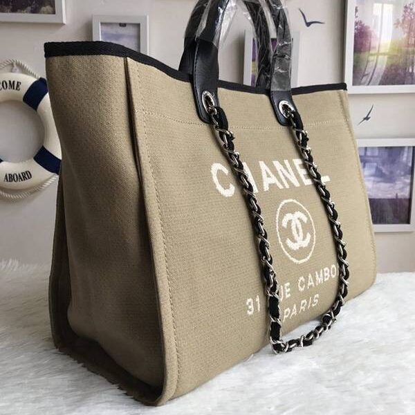 香奈兒錢包高仿chanel 66941大號沙灘牛仔帆布包chanel deauville春夏迪拜度假系列經典購物袋帶手柄大號媽咪包chb10147