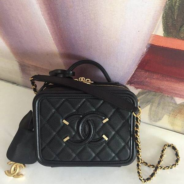 chanel最新款背包chanel春夏新款呢子化妝包單肩斜挎手提chb10629