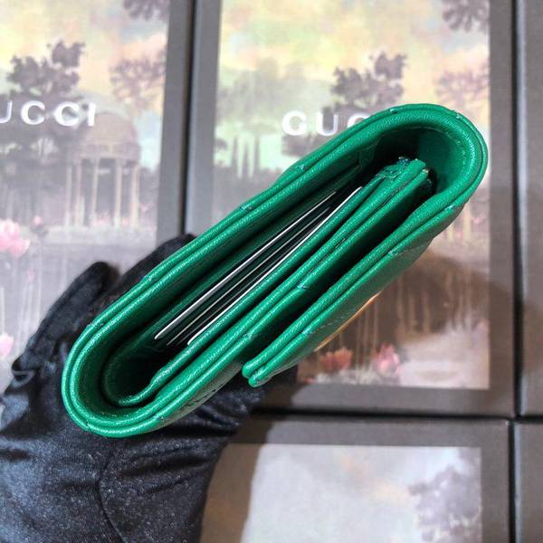 高仿包包原單GG marmont 三折短錢包採用絎縫進口小牛皮打造配以人形紋設計背面配以GG標誌復古金色金屬配件474802,綠色全皮。ydgu10855 5 高仿包包原單GG marmont 三折短錢包採用絎縫進口小牛皮打造配以人形紋設計背面配以GG標誌復古金色金屬配件474802,綠色全皮。ydgu10855