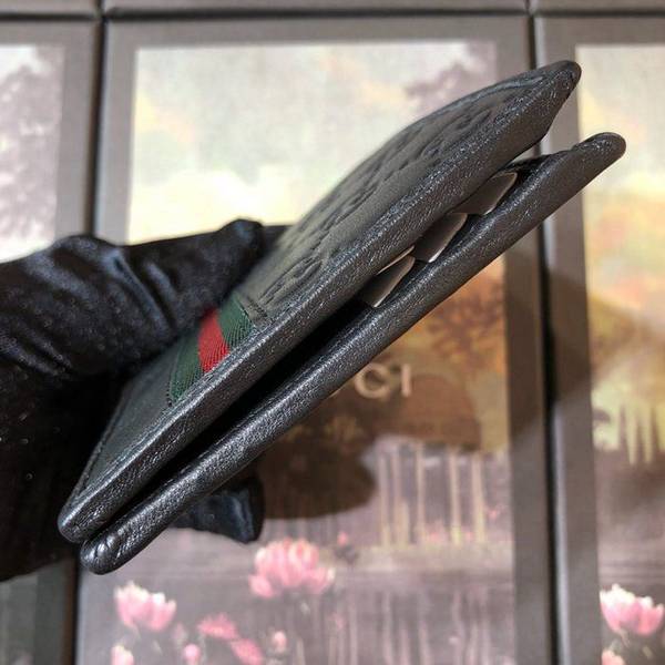原單A貨gucci頂級貨品 專櫃同步,高仿名牌!雙折皮夾,採用進口頭層牛皮搭配醒目紅綠織帶,做工精細138042,克壓花皮ydgu11086 6 原單A貨gucci頂級貨品 專櫃同步,高仿名牌!雙折皮夾,採用進口頭層牛皮搭配醒目紅綠織帶,做工精細138042,克壓花皮ydgu11086