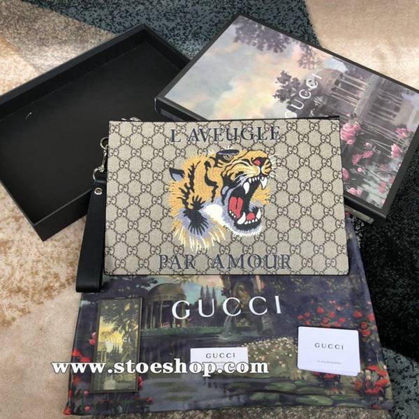 奢侈品1：1gucci原單印花GG 印花裝飾於此款纖薄手包的中央！可拆卸義大利皮制腕帶！內裏側面底部均頂級牛皮製作而成473904，老虎PVCydgu11309