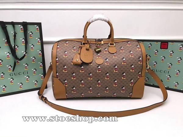原單米奇gucci又一爆款gucci專櫃同步最新款米奇形象GG帆布行李袋Disney x Gucci Disney米色/烏木色迷你GG Supreme高級人造帆布547953ydgu11388