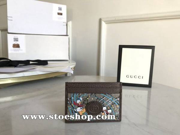 高仿包包批發gucci新款。市場頂級獨家控貨專櫃品質進口牛皮，原廠五金647942啡PVC/唐老鴨ydgu12021