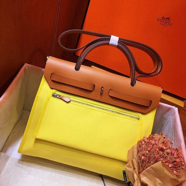 奢侈品1：1愛馬仕Herbag 31Cm瑩光黃/中啡男女神通用版 最學院派的包袋 神名：她的包
