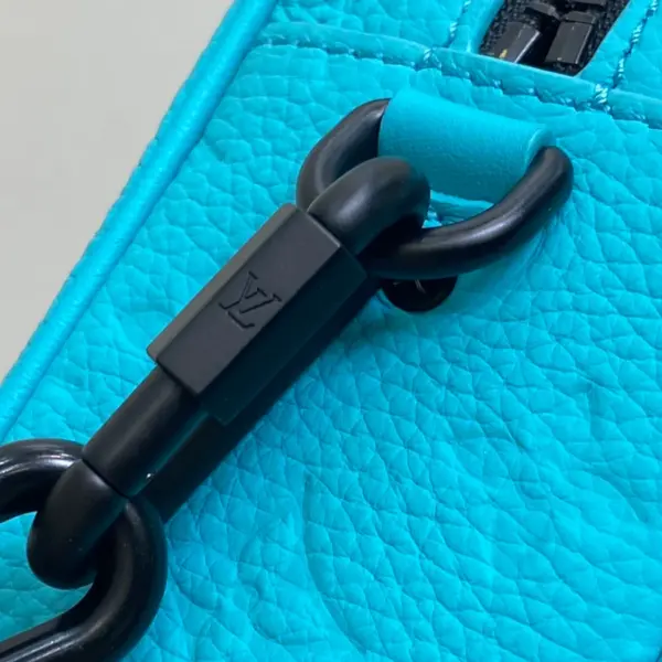 路易威登Mini Soft Trunk Turquoise色Monogram壓花牛皮斜挎包