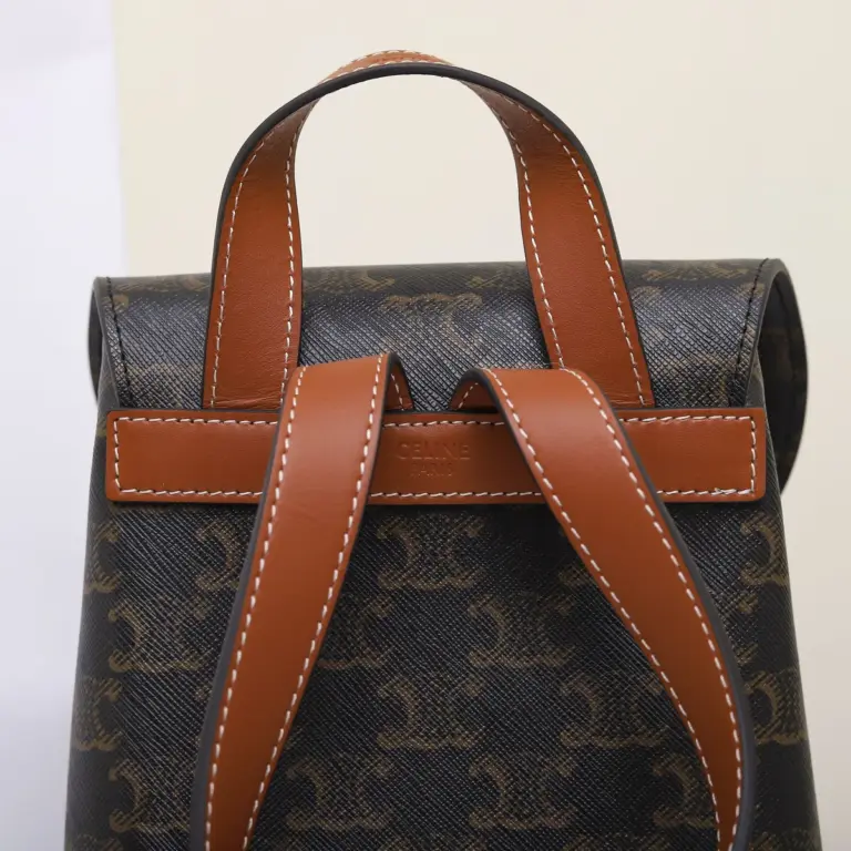 高仿CELINE-賽琳 Saint Laurent TRIOMPHE CANVAS 多功能印花背包-118702