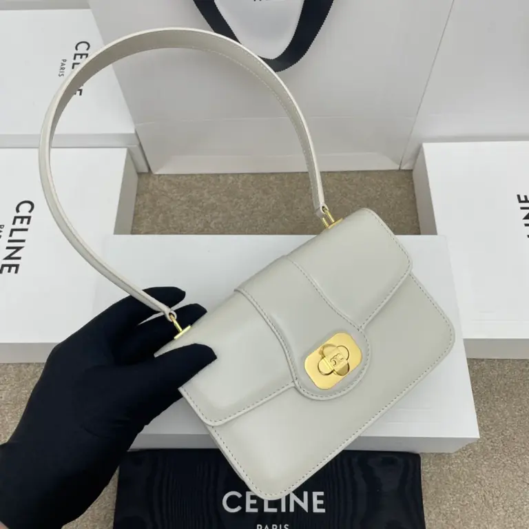 高仿CELINE-賽琳 TRIOMPHE壓印旋轉鎖扣牛皮手提包-121423